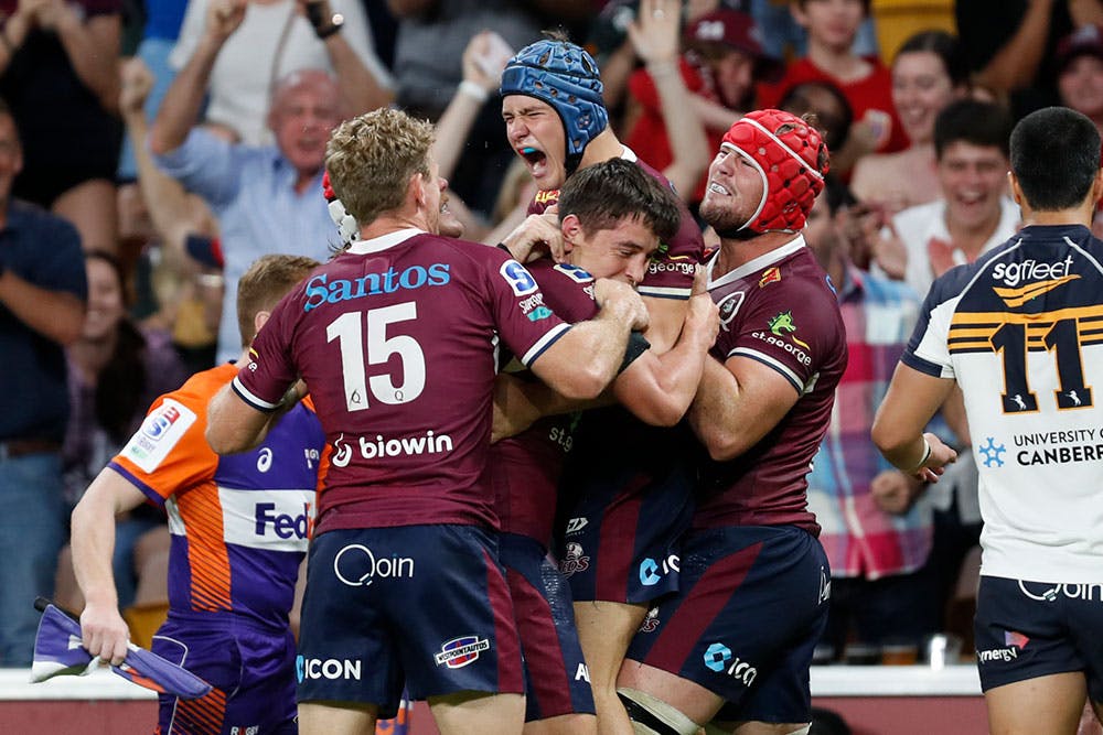 Josh Flook celebrates after scoring a try for Queensland. Photo: Getty